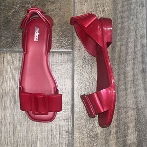 Melissa ruby red bow slipon open toe flats.